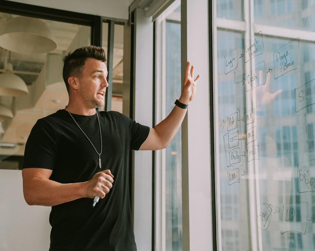 man leading business presentation